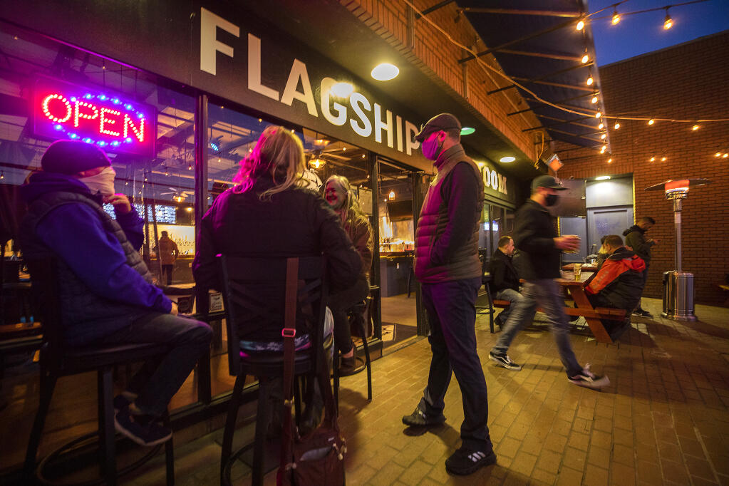 The Flagship Taproom in Santa Rosa notified customers through social media that their patio would be open for business at 2 p.m. after Gov. Newsom lifted stay-at-home orders on Monday, Jan. 25, 2021. (John Burgess / The Press Democrat)