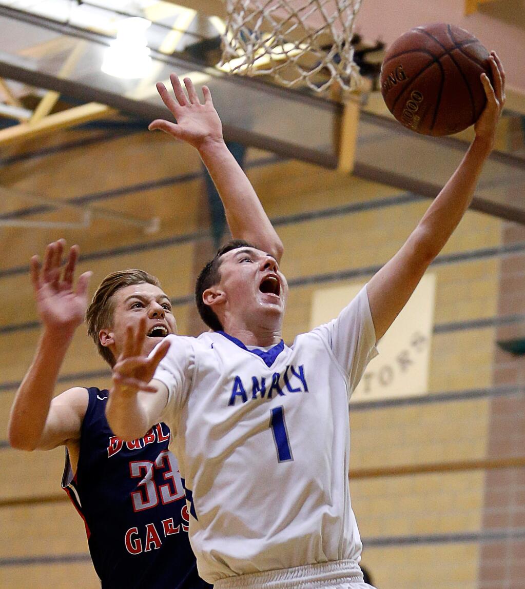 Analy's Aidan Toner-Rodgers right, goes for a layup on a fast break as Dublin's Jack Nielsen defends during the second half at the Windsor Holiday Shootout in Windsor on Thursday, Dec. 29, 2016. (Alvin Jornada / The Press Democrat)
