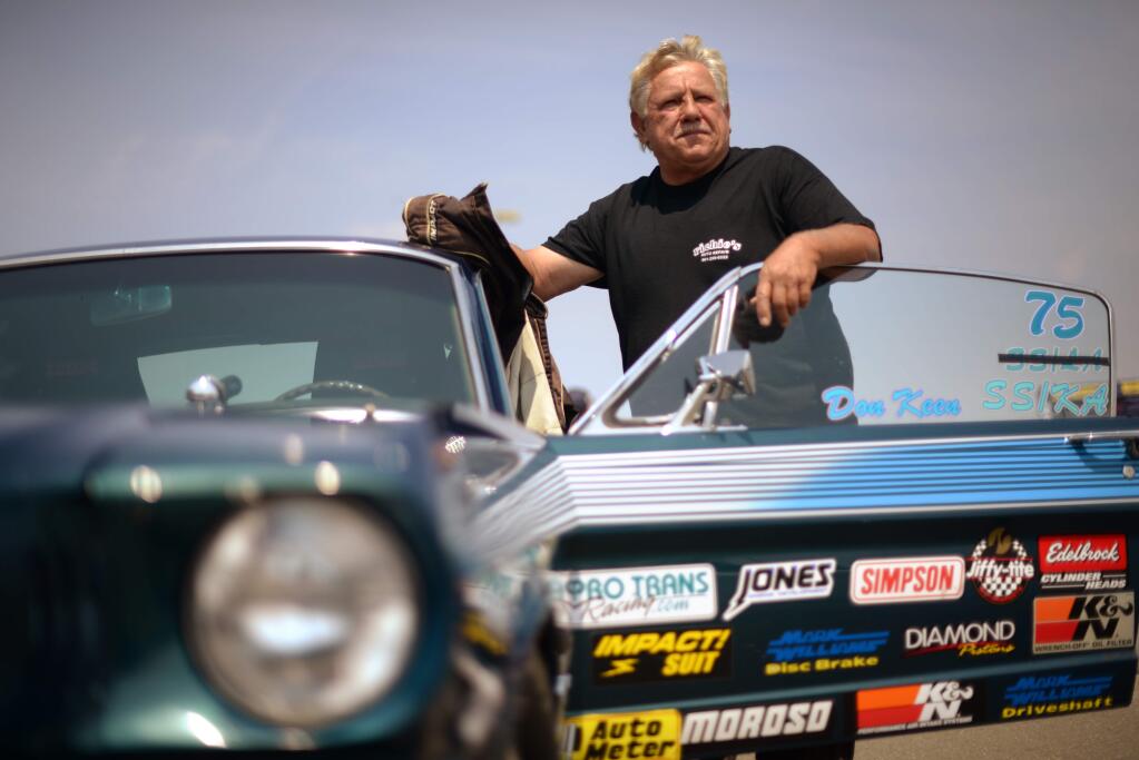 'It's the adrenalin that keeps us all coming back' said Super Stock driver Don Keen, 59, of Palmdale, California next to his 1965 Mustang during the Toyota NHRA Sonoma Nationals held Sunday at Sonoma Race in Sonoma, California. July 29, 2018.(Photo: Erik Castro/for The Press Democrat)