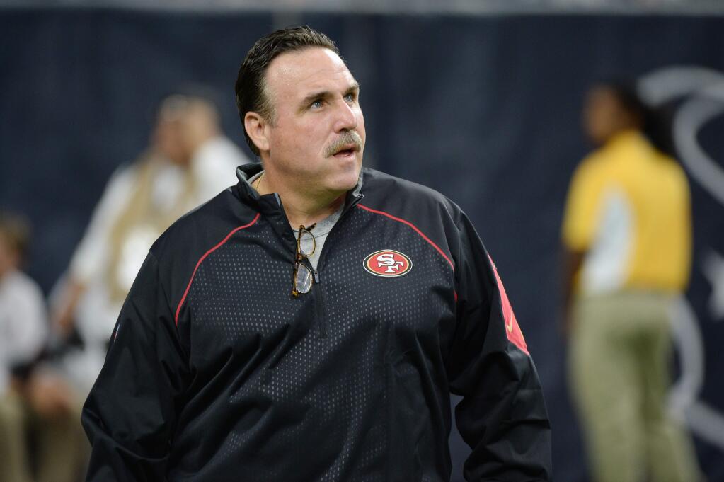 FILE - In this Aug. 15, 2015, file photo, San Francisco 49ers head coach Jim Tomsula watches his players during the first half of an NFL preseason football game against the Houston Texans in Houston. Tomsula won't tolerate fighting from his San Francisco players and doesn't expect it when they hold two joint practices with the Denver Broncos on Wednesday and Thursday before the teams play in a preseason game Saturday night. (AP Photo/George Bridges, File)