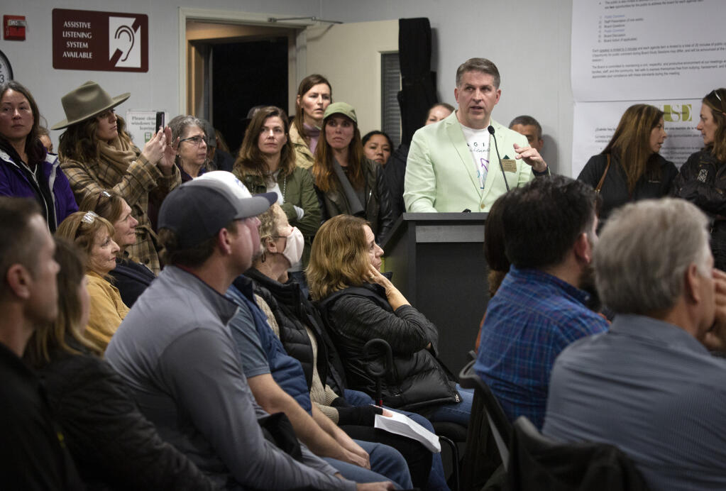 Trustee John Kelly takes to the podium to explain to attendees his plan for reconfiguring Sonoma Valley Unified School District facilities during the Board of Trustees meeting at the district offices on Railroad Avenue on Thursday, March 9. (Robbi Pengelly/Index-Tribune)