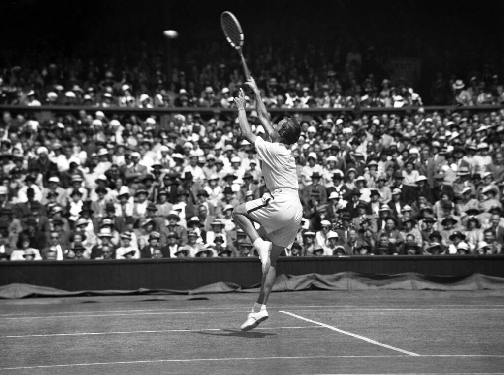 FILE - In this July 6, 1935 file photo, Helen Wills Moody regains the women's singles championship when she defeated Helen Jacobs in the final at the All England Lawn Tennis Championships in Wimbledon, London. Wills Moody won eight Wimbledon titles in an 11-year span, with her final victory coming in 1938. The California-born Wills Moody is considered to be one of the greatest female players in history with 31 Grand Slam titles in all forms. She also won two Olympic gold medals at the 1924 Paris Olympics, the last time tennis was an Olympic sport before being reintroduced at the 1988 Seoul Games. (AP Photo, File)