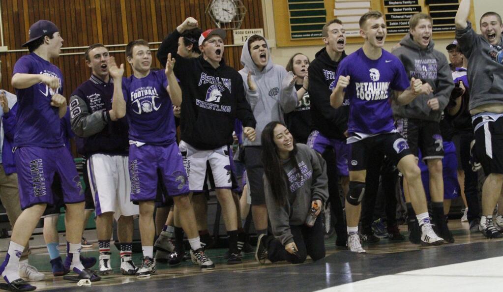 BILL HOBAN/SONOMA INDEX-TRIBUNE STAFFPetaluma High School wrestlers had reason to cheer. They won the Sonoma County League Tournament and their first wrestling championship in 15 years.