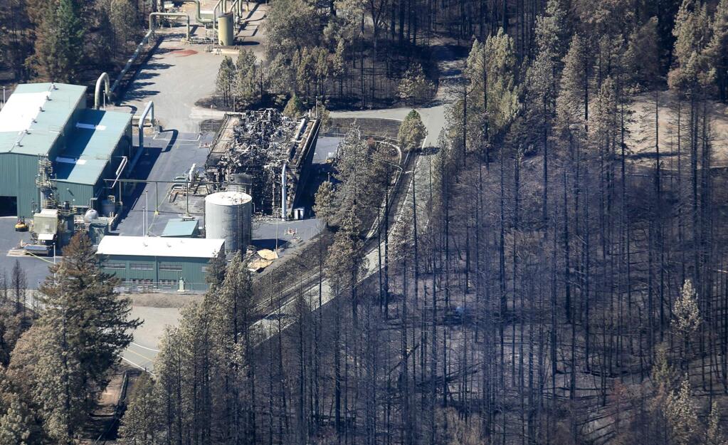 A cooling tower in the Geysers field on Cobb Mountain was damaged by the Valley fire, Friday Sept. 18, 2015. (Kent Porter / Press Democrat) 2015