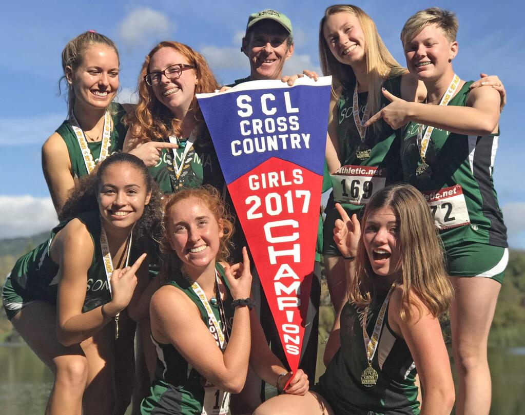 Photo courtesy John LitzenbergThe Lady Dragon cross country team won its fourth straight Sonoma County League title Saturday at spring Lake Park in Santa Rosa. Not only is it the fourth straight title, but the Lady Dragons were undefeated in league meets all four years.