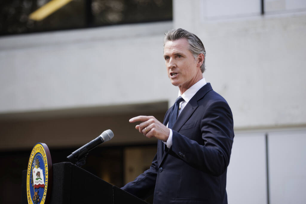 California Governor Gavin Newsom speaks before signing legislation establishing the Community Assistance, Recovery and Empowerment Act, in San Jose, Calif., Wednesday, Sept. 14, 2022.(Dai Sugano/Bay Area News Group via AP)