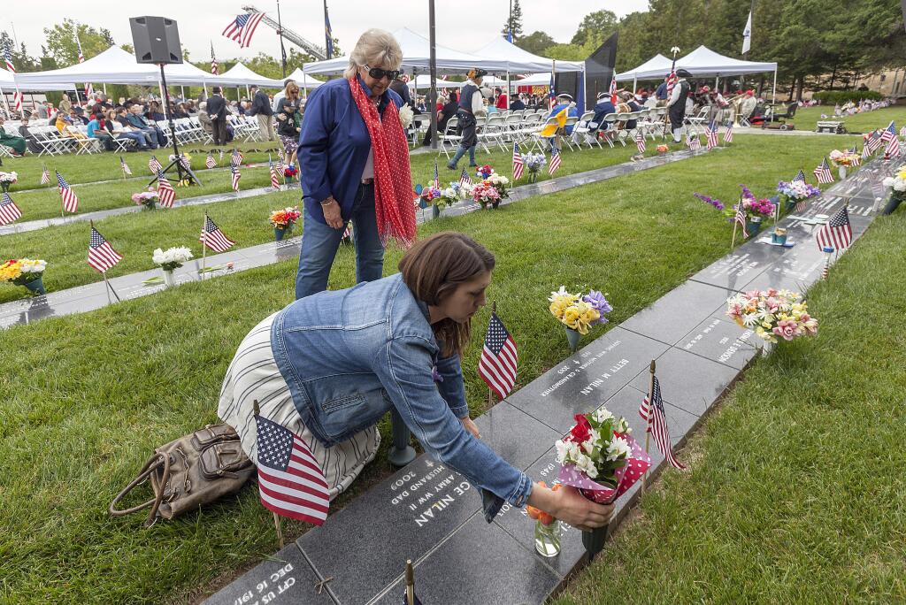 Paula Lely and her daughter Andriana Lely-Gibson honor the memory of husband and father, Dirk Lely at the 57th Annual Sonoma Valley Memorial Day Observance. (Photos by Robbi Pengelly/Index-Tribune)