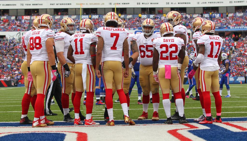 San Francisco 49ers quarterback Colin Kaepernick (7) talks to the offense during the second half of an NFL football game against the Buffalo Bills on Sunday, Oct. 16, 2016, in Orchard Park, N.Y. (AP Photo/Bill Wippert)