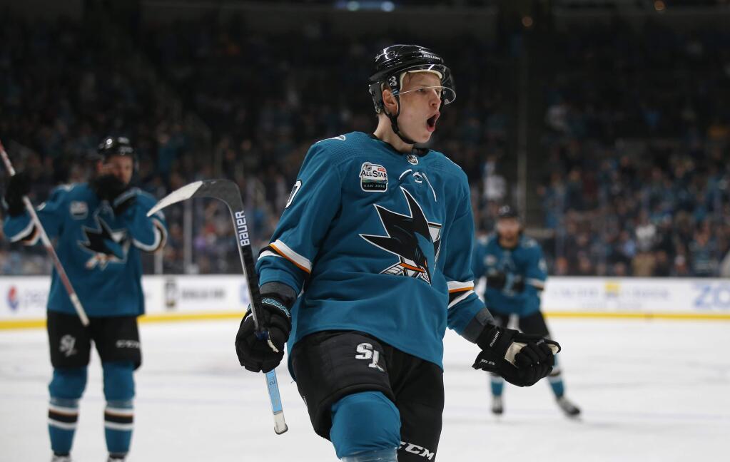 The San Jose Sharks' Antti Suomela celebrates after scoring a goal against the Nashville Predators in the first period in San Jose, Tuesday, Nov. 13, 2018. (AP Photo/Josie Lepe)
