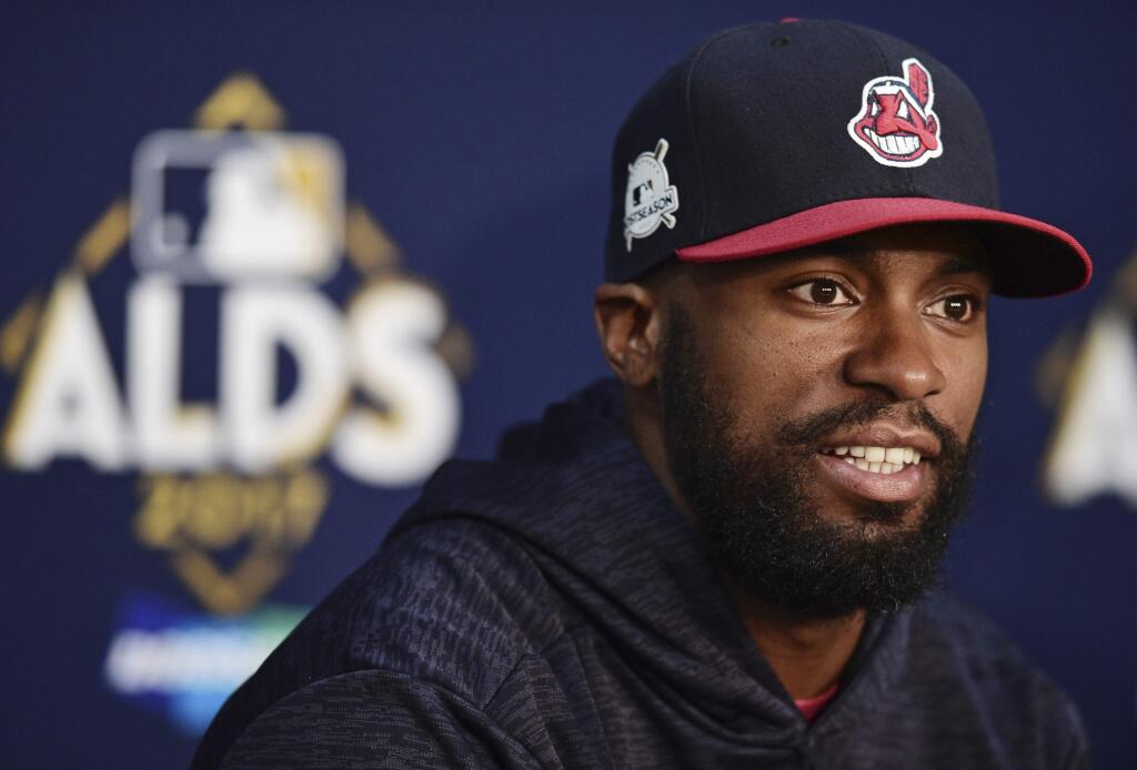FILE - This Oct. 6, 2017 file photo shows Cleveland Indians' Austin Jackson answering questions during a news conference in Cleveland. Two people with knowledge of the contract say Jackson has agreed to terms on a $6 million, two-year contract with the San Francisco Giants, who are filling their top remaining void of the offseason just a few weeks before pitchers and catchers report to spring training. Jackson will earn $3 million per season, the two people said Monday, Jan. 22, 2018 speaking on condition of anonymity because nothing had been announced. (AP Photo/David Dermer, file)