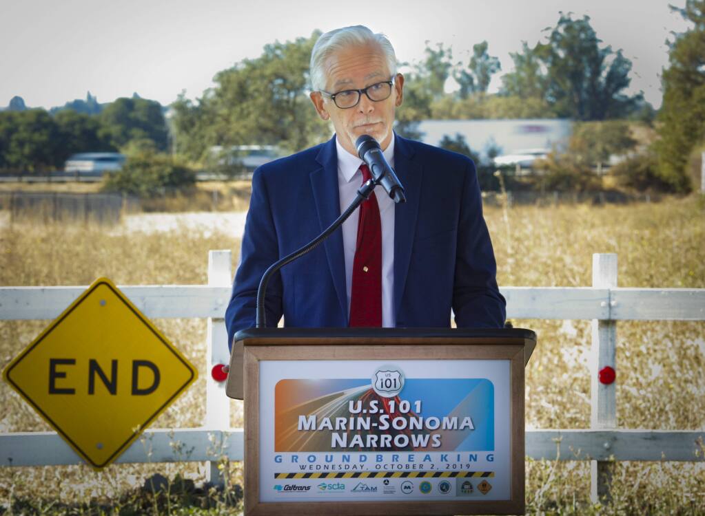 Mark Landman, the Chairman of the Sonoma County Transportation Authority spoke during the groundbreaking ceremony for the Rainier underpass portion of the US 101 Marin-Sonoma Narrows (C2) project held in Petaluma on Wednesday, October 2, 2019. Behind him is the freeway with traffic driving by.(CRISSY PASCUAL/ARGUS-COURIER STAFF)
