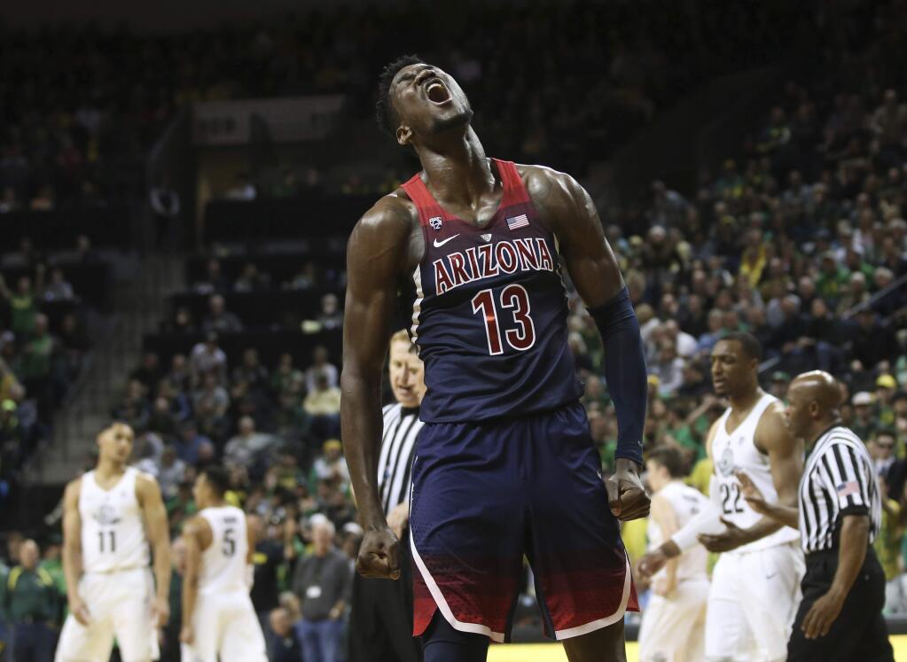 Arizona's DeAndre Ayton celebrates during the second half against Oregon in a game Saturday, Feb. 24, 2018, in Eugene, Ore. Oregon won 98-93 in overtime. (AP Photo/Chris Pietsch)