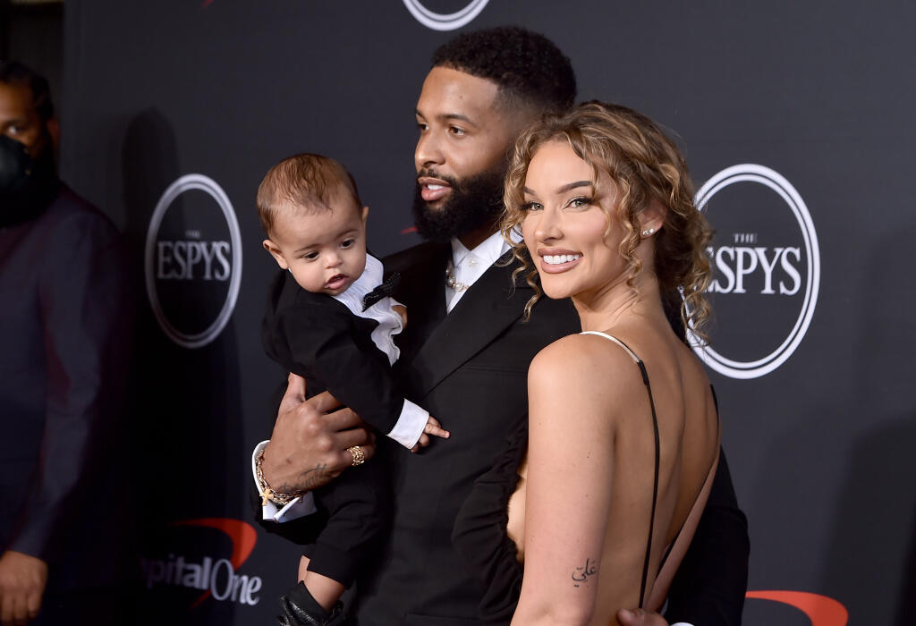 Odell Beckham Jr., left, and Lauren Wood arrive with child Zydn Beckham at the ESPY Awards on Wednesday, July 20, 2022, at the Dolby Theatre in Los Angeles. (Photo by Jordan Strauss/Invision/AP)