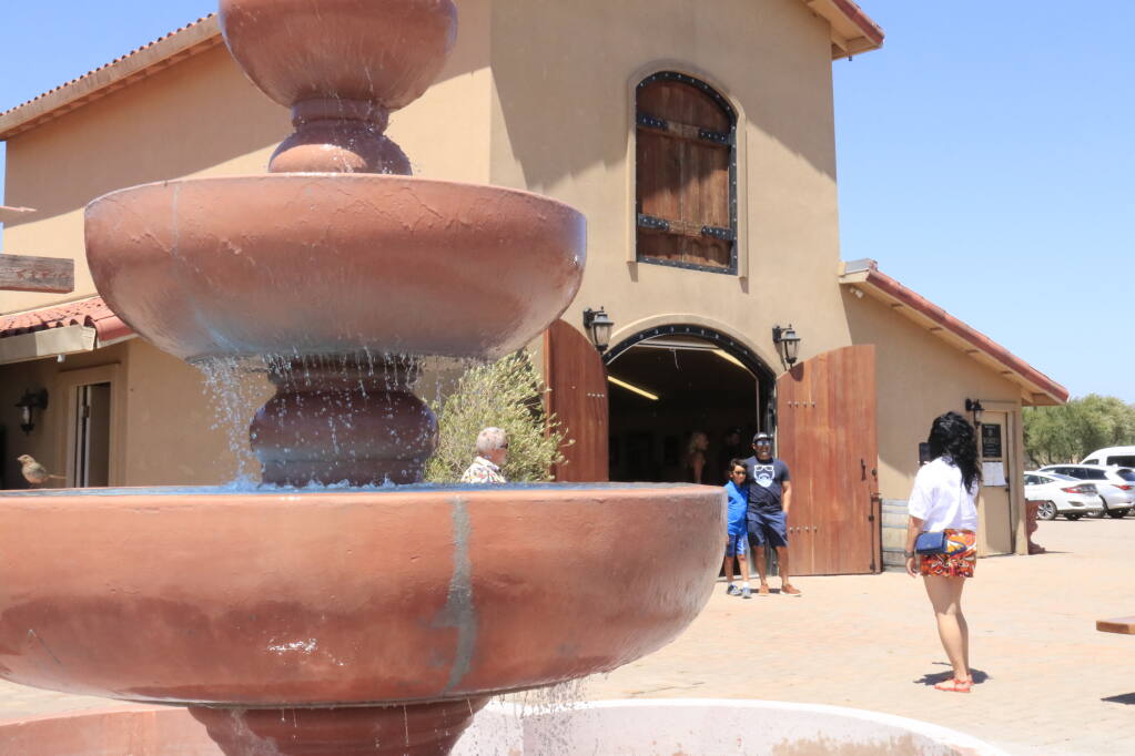 A fountain burbles outside the Robledo Family Winery tasting room on Bonness Road in Schellville. The winery, already a popular stop for wine tours, is planning a significant expansion both in production and hospitality facilities. (Christian Kallen/Index-Tribune)