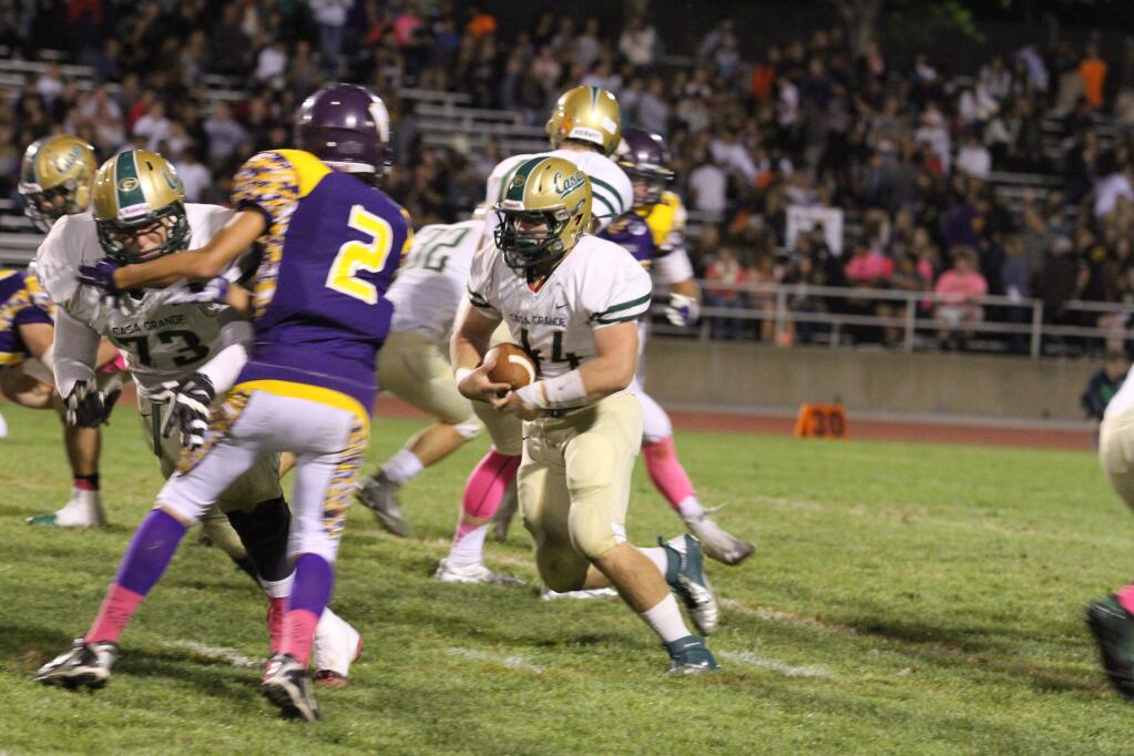 ANTHONY CAMPBELL/FOR THE ARGUS-COURIERCasa Grande fullback Casey Longaker gets a big block from Greg Poteracke. Longaker carried just one time in the game - for a 46-yard touchdown.