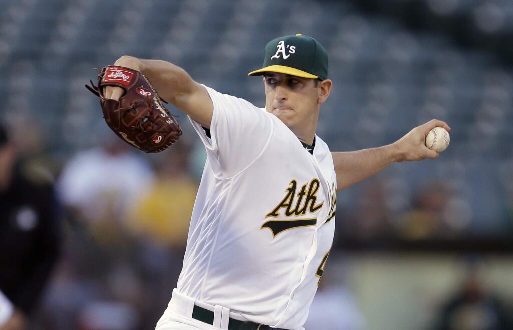 Oakland Athletics pitcher Eric Surkamp works against the Minnesota Twins in the first inning of a baseball game Tuesday, May 31, 2016, in Oakland, Calif. (AP Photo/Ben Margot)