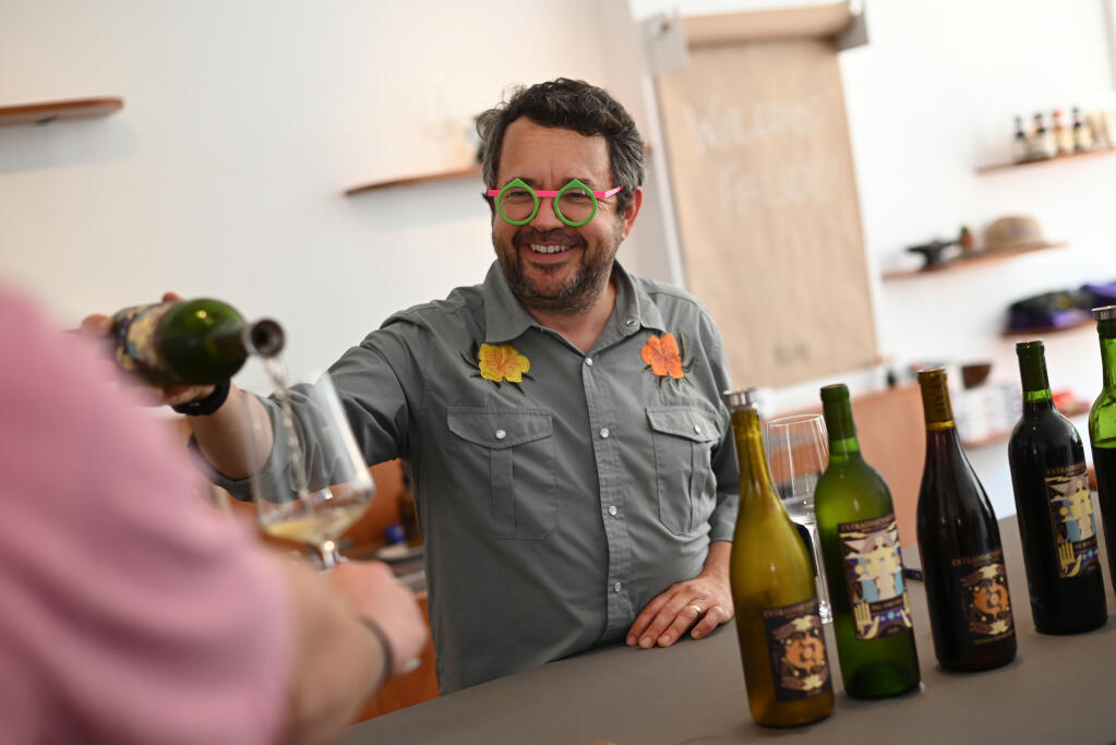 Co-owner Hardy Wallace pouring his wines during a soft opening of his new tasting room for Extradimensional Wine Co. Yeah! in Sonoma, Saturday, Aug. 19, 2023. (Erik Castro / For The Press Democrat)