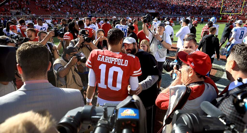 Jimmy Garoppolo greets Lions head coach Matt Patricia after San Francisco's 30-27 win against Detroit, Sunday, Sept. 15, 2018 in Santa Clara. Patricia was the defensive coach with Patriots when Garoppolo played there. (Kent Porter / The Press Democrat) 2018