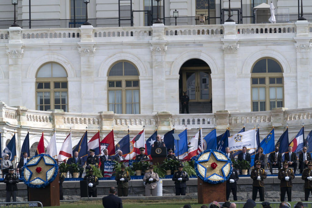 President Joe Biden speaks during a ceremony, honoring fallen law enforcement officers at the 40th annual National Peace Officers' Memorial Service at the U.S. Capitol in Washington, Saturday, Oct. 16, 2021. (AP Photo/Jose Luis Magana)