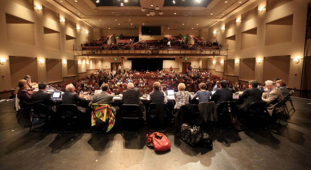 A Napa County planning commission meeting was held at the Napa County Unified School District theater in Napa, Tuesday March 10, 2015 to hold a large crowd as a discussion about a moratorium on new wineries in the Napa County is discussed. (Kent Porter / Press Democrat) 2015