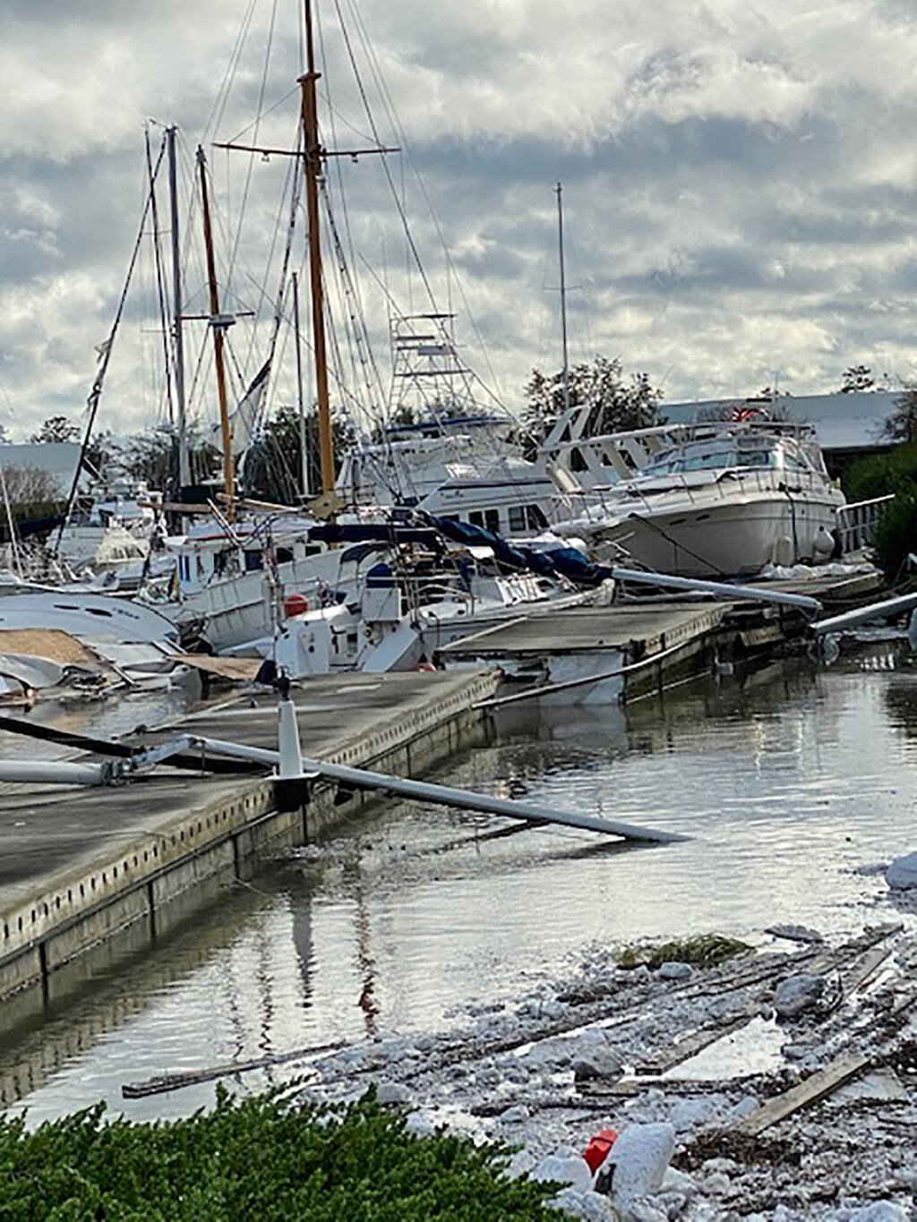 This photo provided by Tina Austin shows damage at the Barber Marina in Elberta, Ala., Wednesday, Sept. 16, 2020, caused by Hurricane Sally. (Tina Austin via AP)