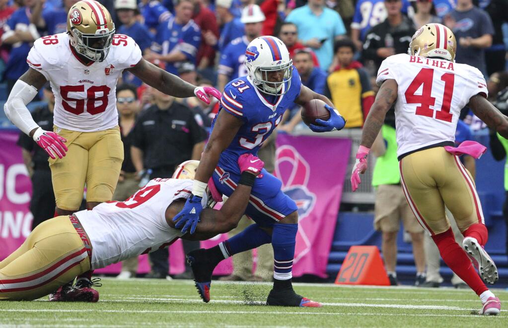 Buffalo Bills running back Jonathan Williams (31) runs during the second half of an NFL football game against the San Francisco 49ers on Sunday, Oct. 16, 2016, in Orchard Park, N.Y. (AP Photo/Bill Wippert)
