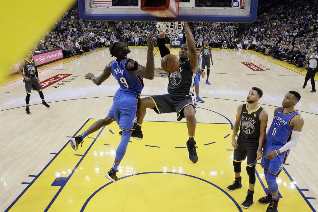 The Golden State Warriors' David West dunks against the Oklahoma City Thunder during the second half Tuesday, Feb. 6, 2018, in Oakland. (AP Photo/Marcio Jose Sanchez)