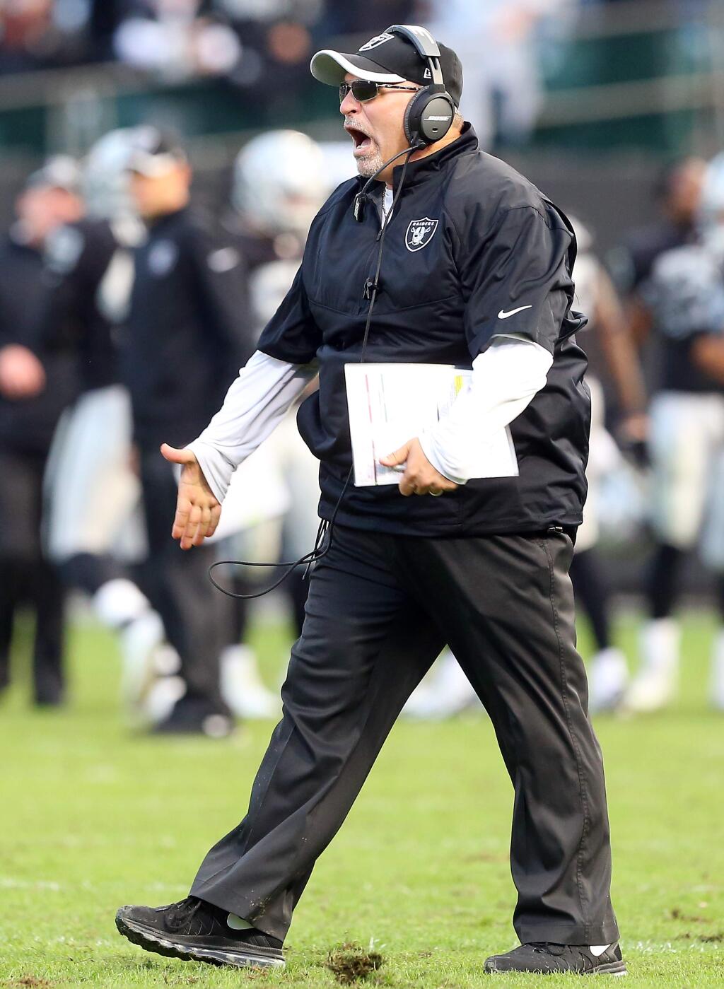 Oakland Raiders interim coach Tony Sparano coaches his team against the Buffalo Bills in Oakland on Sunday, December 21, 2014. The Raiders defeated the Bills 26-24.(Christopher Chung/ The Press Democrat)