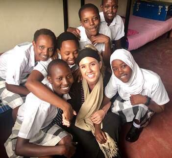 Rohnert Park native Ashley Randolph surrounded by young people she met in Africa.(ASHLEY RANDOLPH)