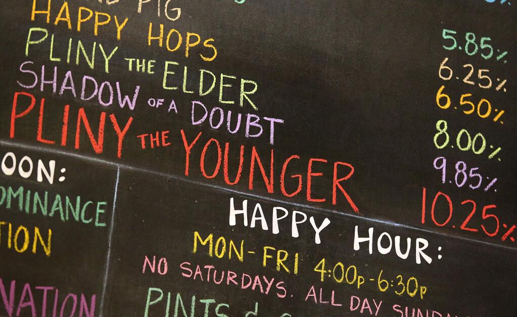 A chalkboard sign shows the alcohol content of this year's Pliny the Younger at Russian River Brewing Company, in Santa Rosa on Friday, February 2, 2018. (Christopher Chung/ The Press Democrat)