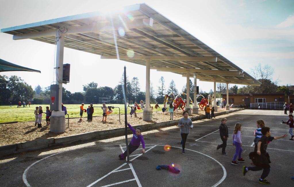 Petaluma, CA, USA. Tuesday, January 31, 2017._ Students at the Mary Collins School have recess on the playground where solar panels were installed on the campus. (CRISSY PASCUAL/ARGUS-COURIER STAFF)