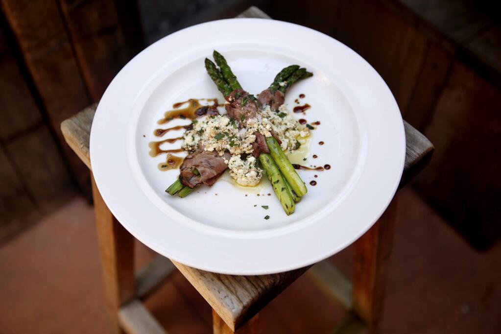 Grilled asparagus, ricotta cheese and coppa cotta at The Girl & the Fig in Sonoma, on Wednesday, May 27, 2015. (BETH SCHLANKER/ The Press Democrat)xddddxcvv ccc