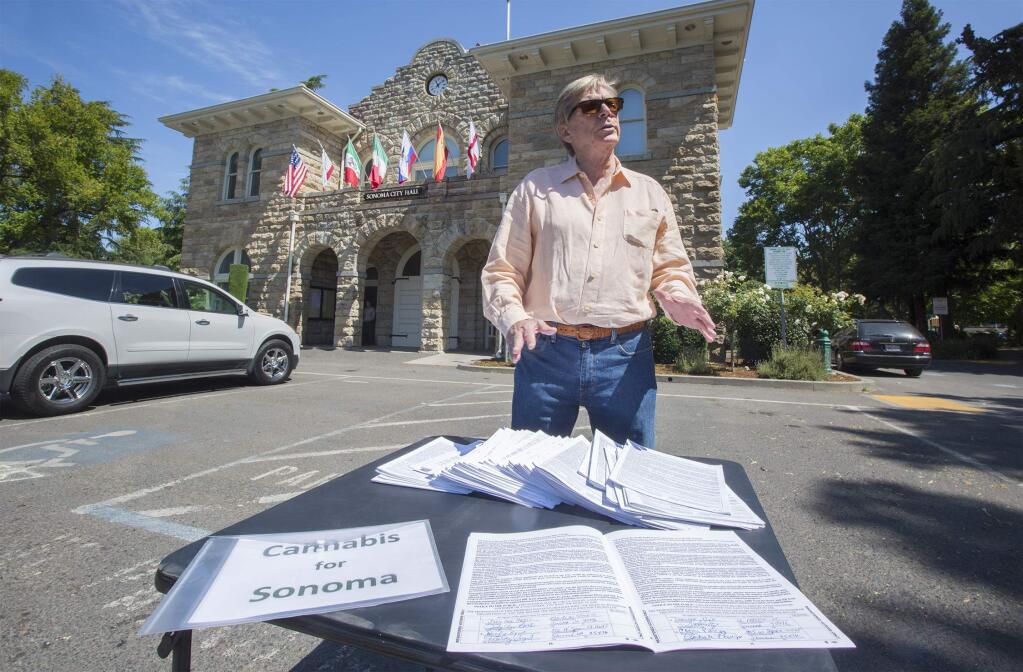 Jon Early at City Hall with the 791 signatures he collected in support of a allowing cannabis businesses within the Sonoma city limits, in June, 2018. The petition will be on the Nov. 2020 ballot, unless Earlyl himself requests its removal. (Photo by Robbi Pengelly/Index-Tribune)