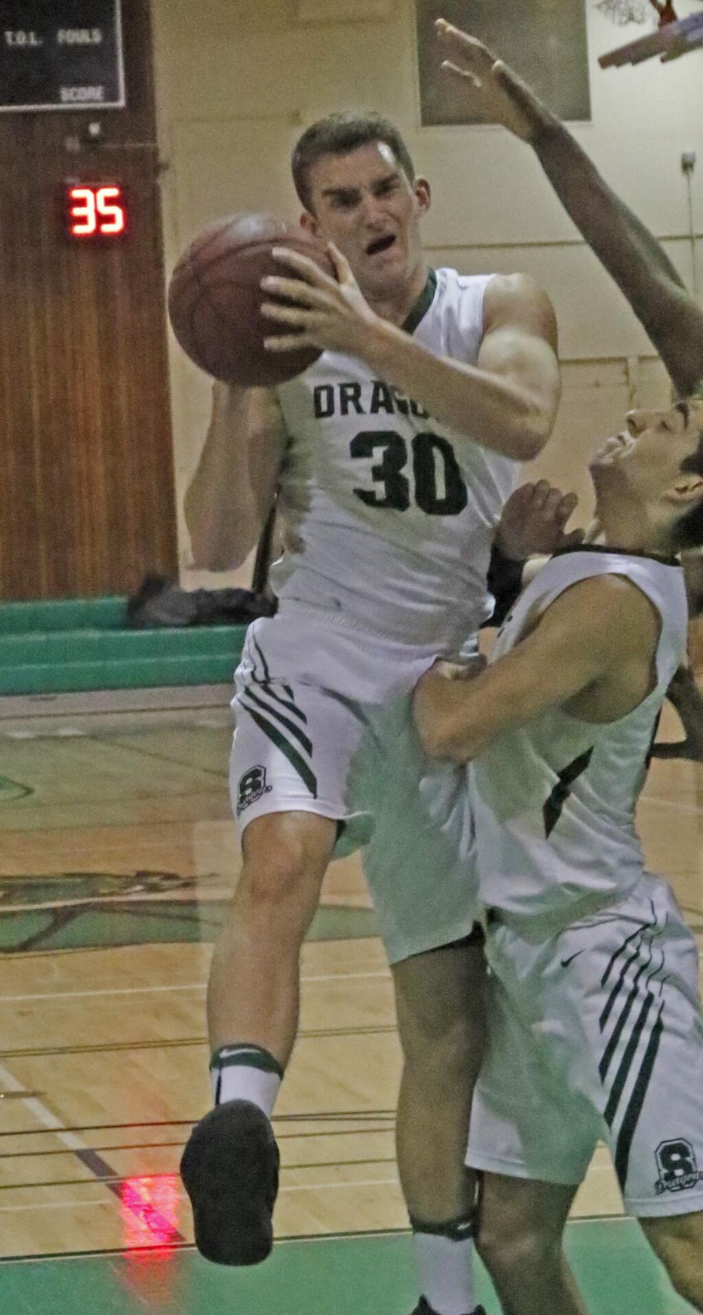 Bill Hoban/Special to the Index-TribuneSonoma's Nick Spanger (#30) pulls down a rebound in a recent game. The Dragons will host Alhambra tonight, Tuesday, and will host Rancho Cotate on Thursday.