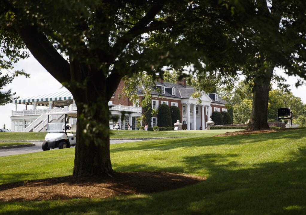 The clubhouse of Trump National Golf Club is seen from the media van, Thursday, Aug. 9, 2018, Bedminster, N.J., before a President Donald Trump meets with state leaders about prison reform.(AP Photo/Carolyn Kaster)