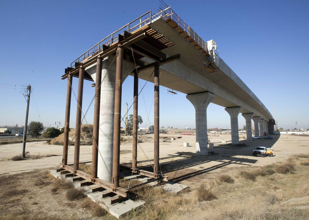 FILE - This Dec. 6, 2017 file photo shows an elevated sections of the high-speed rail under construction in Fresno, Calif. (AP Photo/Rich Pedroncelli, File)