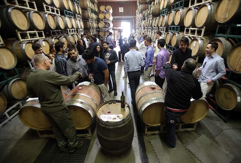 Wine lovers gather for the 36th Annual Wine Road Barrel Tasting at Wilson Winery in 2014. (PD FILE)