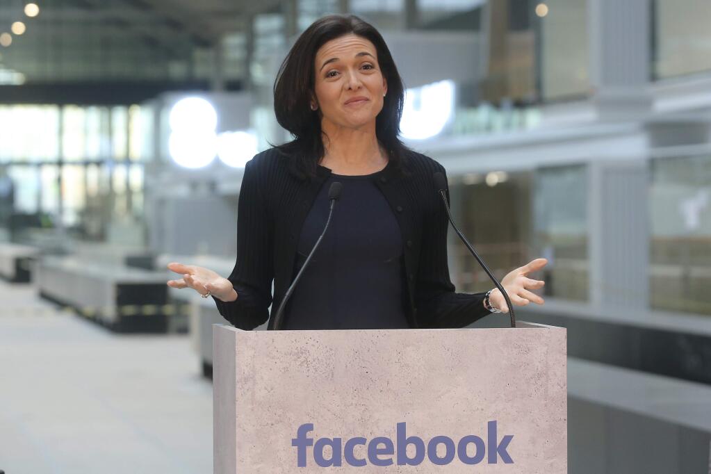 FILE - In this Jan. 17, 2017, file photo, Chief Operating Officer of Facebook, Sheryl Sandberg, delivers a speech during the visit of a start-up companies gathering at Paris' Station F in Paris. For the past decade, Sheryl Sandberg has been the poised, reliable second-in-command to Facebook CEO Mark Zuckerberg, helping steer Facebook's rapid growth around the world, while also cultivating her brand in ways that hint at aspirations well beyond the social network. (AP Photo/Thibault Camus, File)