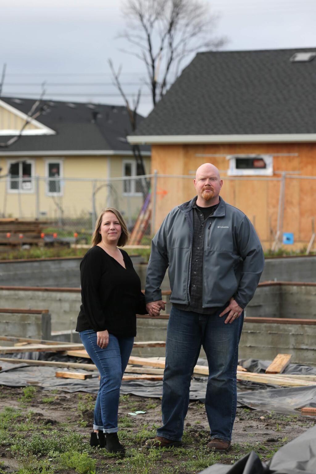 Christine and Shawn Ratliff, the leaders of the Larkfield Resilience Fund, stand on their lot on Oxford Ct. in Larkfield-Wikiup, California on Tuesday, March 26, 2019. (Ramin Rahimian for The Press Democrat)