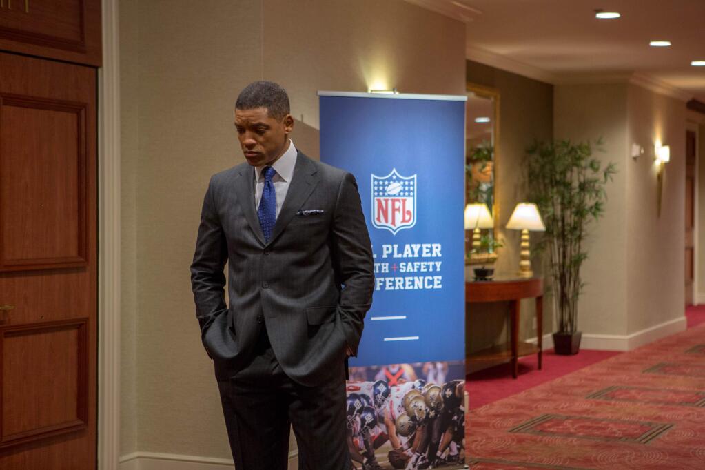 This photo provided by Columbia Pictures shows, Will Smith as Dr. Bennet Omalu, in a scene from Columbia Pictures' 'Concussion.' The movie releases in U.S. theaters on Dec. 25, 2015. (Melinda Sue Gordon/Columbia Pictures via AP)