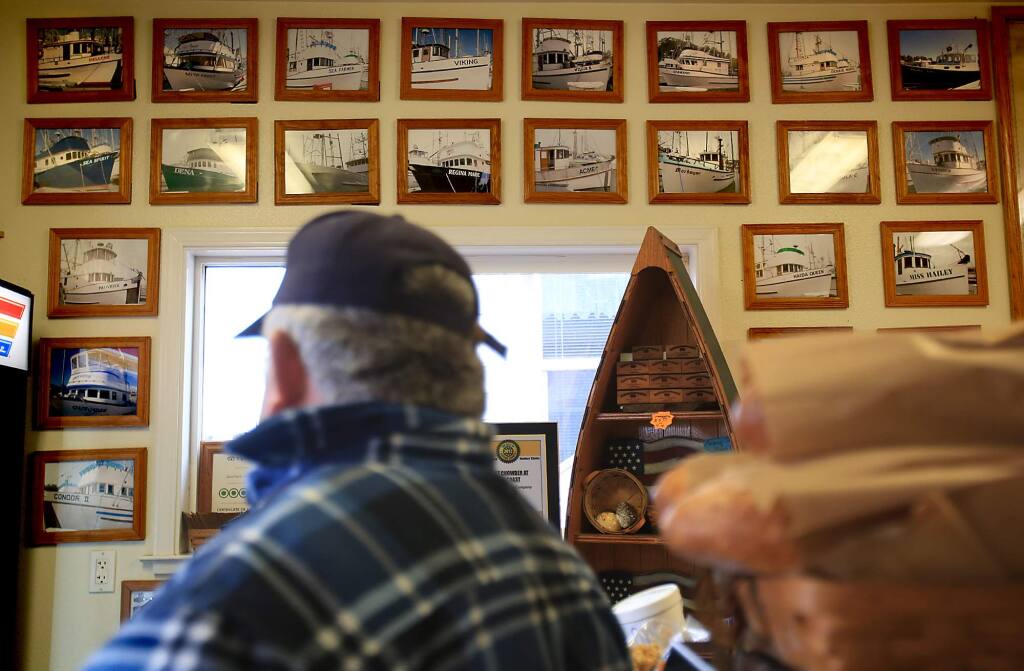 Tony Anello who captains the Annabelle, also has a hand in the family business at the Spud Point Crab Company restaurant at Spud point in Bodega Bay. Anello has lined the walls with pictures of vessels the family has operated, Thursday Jan. 14, 2016, (Kent Porter / Press Democrat) 2016