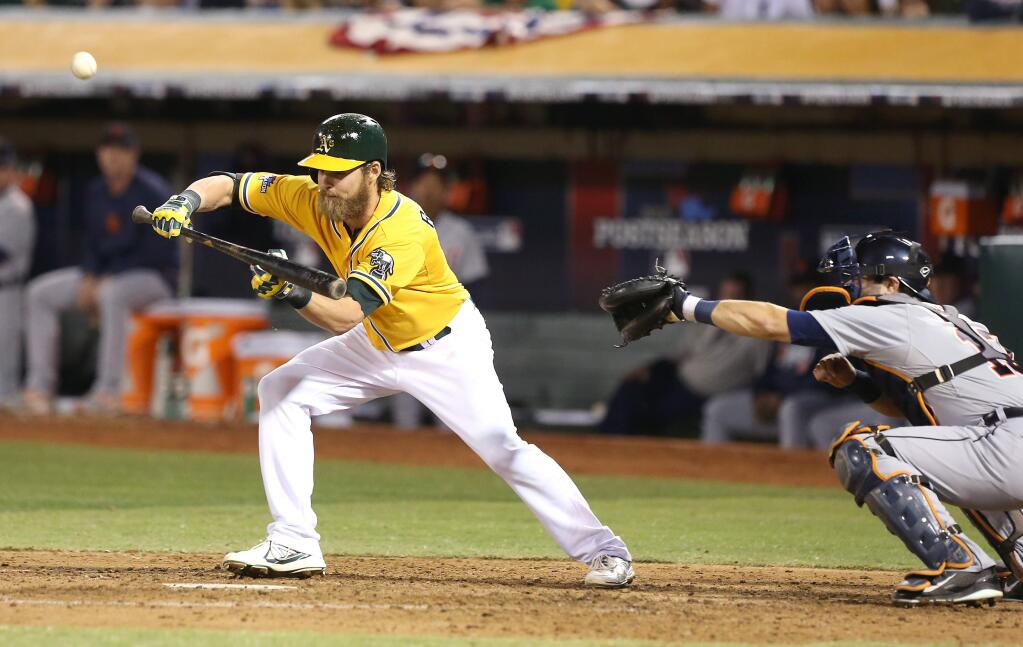 Oakland A's batter Josh Reddick pops up a bunt and flies out during the fifth inning of Game 2 of the ALDS against the Detroit Tigers in Oakland on Saturday, Oct. 5, 2013. (CHRISTOPHER CHUNG/ PD FILE)