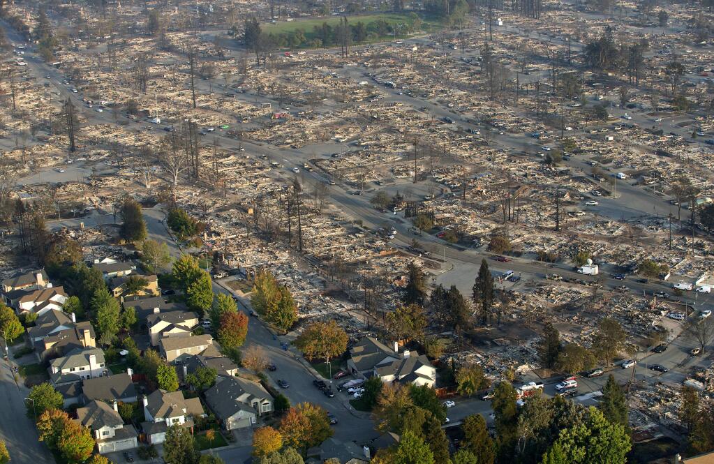 An aerial view of the destruction in Coffey Park in Santa Rosa during a flight with Helico Sonoma . (photo by John Burgess/The Press Democrat)