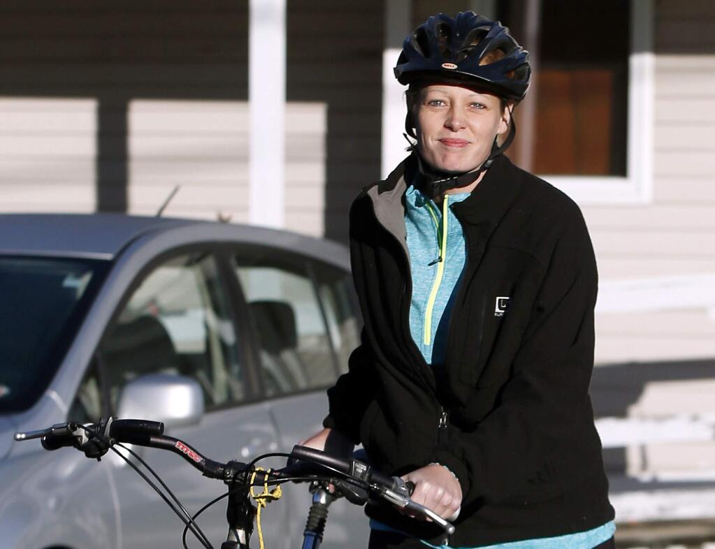 Nurse Kaci Hickox leaves her home on a rural road in Fort Kent, Maine, to take a bike ride with her boyfriend Ted Wilbur, Thursday, Oct. 30, 2014. (AP Photo/Robert F. Bukaty)