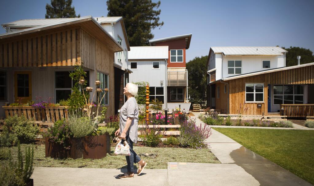 Dee Ballantyne is one of the first residents at the Keller Court Commons in Petaluma. The pocket neighborhood was recently awarded a Golden Nugget Grand Award, citing its design, sustainability and neighborly features. (CRISTINA PASCUAL/ARGUS-COURIER STAFF)
