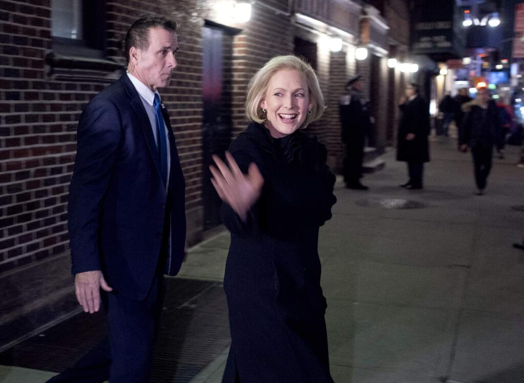Sen. Kirsten Gillibrand leaves the Ed Sullivan Theater? after taping an appearance on 'The Late Show with Stephen Colbert' Tuesday, Jan. 15, 2019, in New York. The New York Democrat announced that she is forming an exploratory committee to run for President in 2020. (AP Photo/Craig Ruttle)