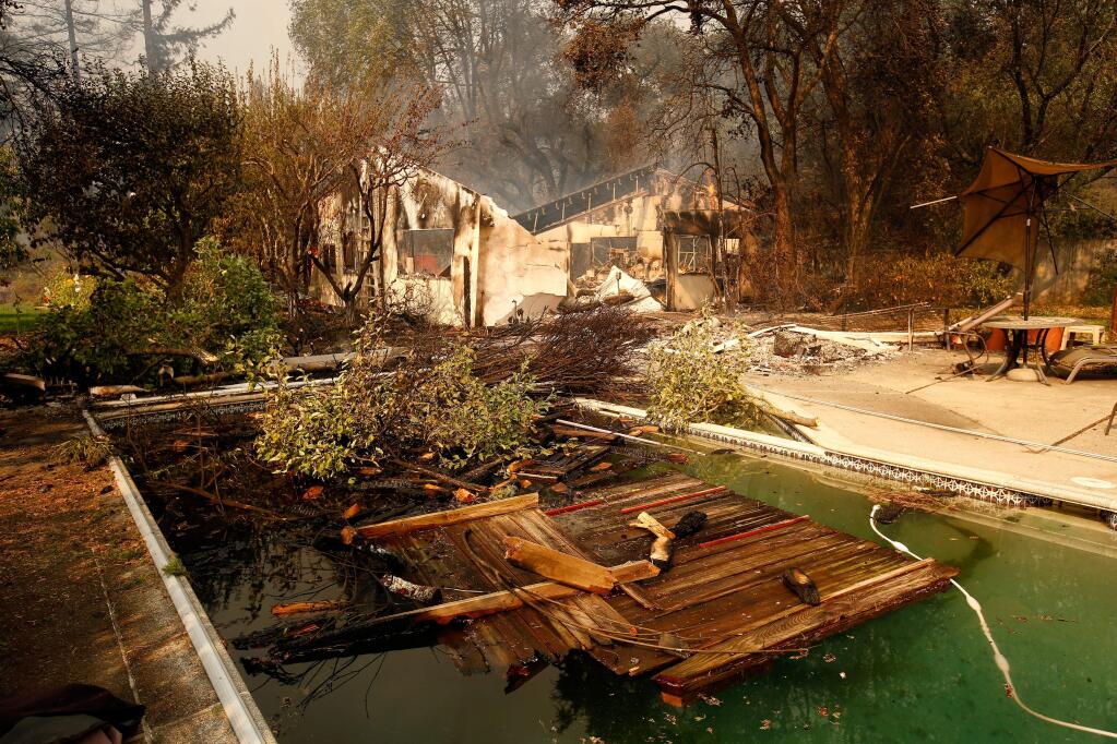 Damage in the backyard of a home off Deer Park Road after the Tubbs Fire burned through north Santa Rosa, California on Monday, October 9, 2017. (Alvin Jornada / The Press Democrat)