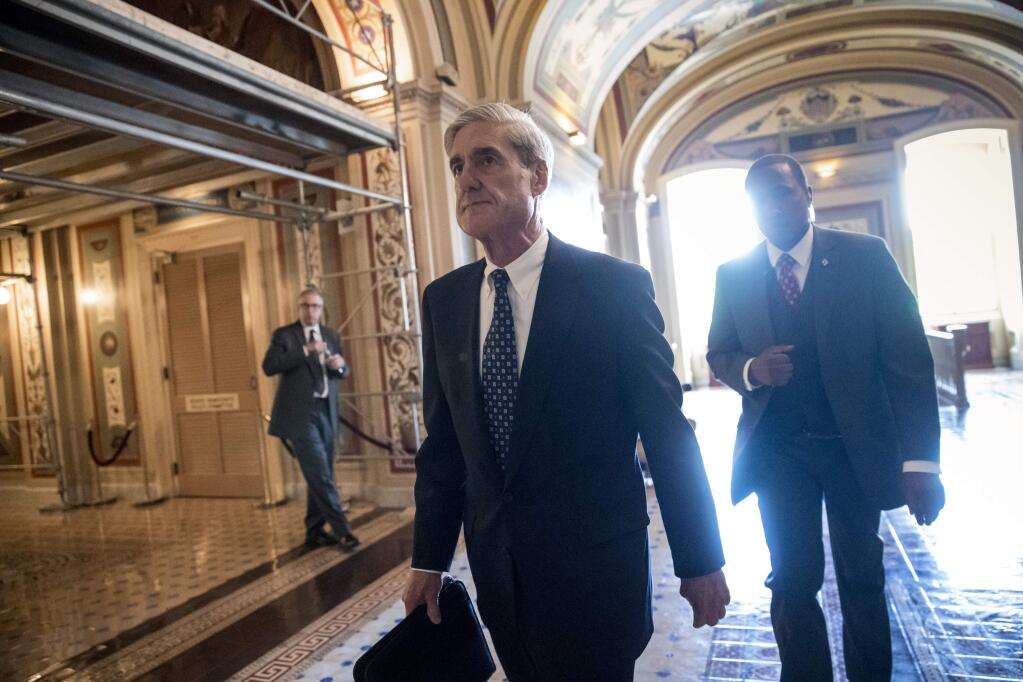 FILE - In this June 21, 2017, file photo, Special Counsel Robert Mueller departs after a closed-door meeting with members of the Senate Judiciary Committee about Russian meddling in the election at the Capitol in Washington. (AP Photo/J. Scott Applewhite, File)