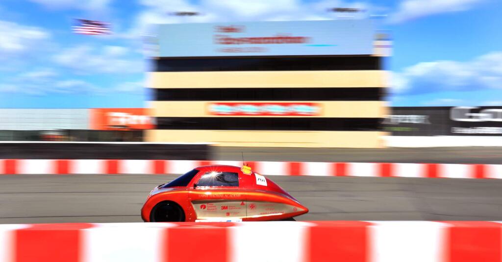 The Saint Thomas Academy vehicle speeds off on the Shell Eco-Marathon road course at Sonoma Raceway, Thursday, April 19, 2018 in Sonoma. The team from Mendota Heights, Minnesota was named the world champion during the event in 2017. (Kent Porter / The Press Democrat) 2018