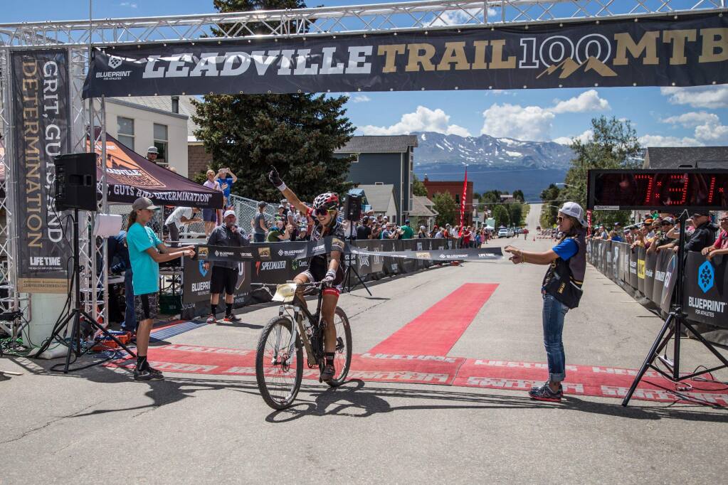 Larissa Connors is all smiles after winning the grueling Leadville 100 mountain bike race Aug. 12 in Leadville, Colorado. (GLEN DELMAN PHOTOGRAPHY)